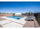 Refreshing swimming pool with lounge chairs and clean, modern tiled deck at 2113 N 66Th St, Scottsdale, AZ 85257