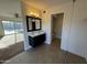 Bathroom with double vanity, modern sink, and toilet at 2221 S Saratoga Dr, Mesa, AZ 85202