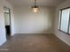 Bright dining area with tile flooring and a ceiling light fixture at 2221 S Saratoga Dr, Mesa, AZ 85202