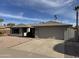 House exterior showcasing a well-maintained front yard and driveway at 2221 S Saratoga Dr, Mesa, AZ 85202