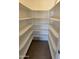 Walk-in pantry offering ample storage shelves at 2221 S Saratoga Dr, Mesa, AZ 85202