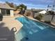 Long rectangular pool with large patio at 2221 S Saratoga Dr, Mesa, AZ 85202