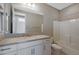 Clean bathroom with a bathtub, toilet, and single vanity at 2477 W Market Pl # 55, Chandler, AZ 85248