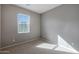 Bright bedroom with a window and neutral wall colors at 2477 W Market Pl # 55, Chandler, AZ 85248