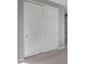 White closet with double doors and vertical paneling at 2477 W Market Pl # 55, Chandler, AZ 85248