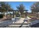 Modern dog park with pergola and shaded areas at 2477 W Market Pl # 55, Chandler, AZ 85248