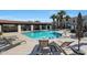 Inviting community pool with lounge chairs and covered patio at 2477 W Market Pl # 55, Chandler, AZ 85248