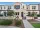 2-story townhome with front walkway and mature landscaping at 2477 W Market Pl # 55, Chandler, AZ 85248