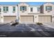 Three-unit building with attached garages and landscaping at 2477 W Market Pl # 55, Chandler, AZ 85248