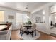 Cozy dining area with a stylish round table, complementary rug, and seamless flow to living spaces at 3129 W Fremont Rd, Phoenix, AZ 85041