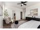 Bright and airy main bedroom showcasing modern decor, a ceiling fan, carpet, and lots of natural light at 3129 W Fremont Rd, Phoenix, AZ 85041