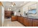 Spacious kitchen with ample cabinetry and granite countertops at 3432 N 86Th Ave, Phoenix, AZ 85037