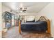 Main bedroom with mirrored closet and backyard access at 3432 N 86Th Ave, Phoenix, AZ 85037