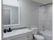 Bathroom with a vanity, toilet, bathtub, and tiled shower at 356 Ancora W Dr, Litchfield Park, AZ 85340