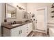 Elegant bathroom with double vanity and modern fixtures at 4213 E Stanford Ave, Gilbert, AZ 85234