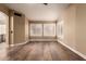 Bedroom with wood floors, plantation shutters, and natural light at 4213 E Stanford Ave, Gilbert, AZ 85234