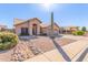 Single-story house with a two-car garage and a saguaro cactus at 4213 E Stanford Ave, Gilbert, AZ 85234