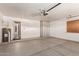 Garage with epoxy flooring and storage cabinets at 4213 E Stanford Ave, Gilbert, AZ 85234