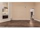 Bright living room with fireplace and hardwood floors at 4213 E Stanford Ave, Gilbert, AZ 85234