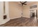 Spacious living area with a fireplace and wood floors at 4213 E Stanford Ave, Gilbert, AZ 85234