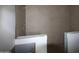 Bathroom featuring light brown tile and sleek fixtures at 431 W Rough Rider Rd, New River, AZ 85087