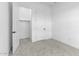 Bright bedroom with large closet, white trim, and carpet floors at 4412 N 203Rd Dr, Buckeye, AZ 85396