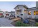 Inviting front yard with fireplace and seating area at 4841 E Amelia Ave, Phoenix, AZ 85018