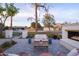 Outdoor patio with seating area, fire pit, and landscaping at 4841 E Amelia Ave, Phoenix, AZ 85018