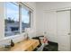 Light-filled home office with window seat and fireplace view at 4841 E Amelia Ave, Phoenix, AZ 85018