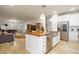 Open concept kitchen island with butcher block countertops and stainless steel appliances at 4841 E Amelia Ave, Phoenix, AZ 85018