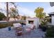 Backyard patio features a built-in fire pit and comfortable seating at 4841 E Amelia Ave, Phoenix, AZ 85018