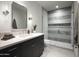 Clean bathroom with walk-in shower and dark vanity at 4942 N Ascent Dr, Scottsdale, AZ 85251