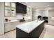 Contemporary kitchen featuring marble countertops and sleek cabinetry at 4942 N Ascent Dr, Scottsdale, AZ 85251