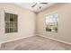 Spacious bedroom with neutral carpet and large window at 5077 S Barley Way, Gilbert, AZ 85298