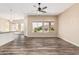 Bright living room with large windows and backyard view at 5077 S Barley Way, Gilbert, AZ 85298