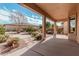 Covered patio overlooks a landscaped backyard at 5077 S Barley Way, Gilbert, AZ 85298