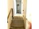 Upstairs hallway with view to display cabinet and natural light at 5131 W Fairview St, Chandler, AZ 85226