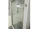 Modern shower with a glass enclosure, gray tile, and updated fixtures at 5131 W Fairview St, Chandler, AZ 85226