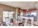 Kitchen and dining area with breakfast bar and granite countertops at 5350 E Deer Valley Dr # 4248, Phoenix, AZ 85054