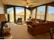 Spacious living room with large windows and sectional sofa at 5350 E Deer Valley Dr # 4248, Phoenix, AZ 85054