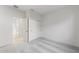 An airy bedroom with neutral colors featuring new carpet, closet and large sliding door entry at 6383 W Georgetown Way, Florence, AZ 85132