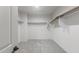 Walk-in closet with carpeted flooring, overhead light and shelving for maximum storage space at 6383 W Georgetown Way, Florence, AZ 85132