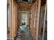 Hallway under construction with exposed framing at 6609 N 20Th Ave, Phoenix, AZ 85015