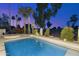 Backyard with a pool, comfortable seating and covered patio; the outdoor space is perfect for relaxing and entertaining at 7500 E Mccormick Pkwy # 19, Scottsdale, AZ 85258