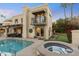 Stunning exterior showcasing a pool, hot tub, balcony, and outdoor entertaining area at 7500 E Mccormick Pkwy # 19, Scottsdale, AZ 85258