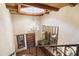 Elegant foyer showcases a chandelier, wooden accents, and staircase at 7500 E Mccormick Pkwy # 19, Scottsdale, AZ 85258