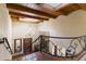 Elegant foyer showcases a chandelier, wooden accents, and staircase at 7500 E Mccormick Pkwy # 19, Scottsdale, AZ 85258