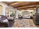 Inviting living room with columns, beamed ceiling, and elegant furniture at 7500 E Mccormick Pkwy # 19, Scottsdale, AZ 85258