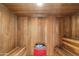 Inviting wooden sauna featuring built-in benches and optimal relaxation ambiance at 7500 E Mccormick Pkwy # 19, Scottsdale, AZ 85258