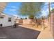 Backyard patio with fire pit and mature tree at 8344 E Indianola Ave, Scottsdale, AZ 85251